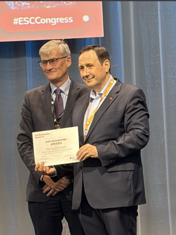 A image of BHF professor Martin Bennett received the John Shillingford Award at the 2026 ESC Conference 